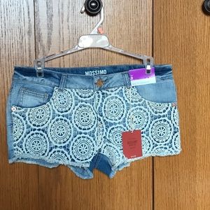 Ladies short denim shorts with lace front detailing. Size 9.